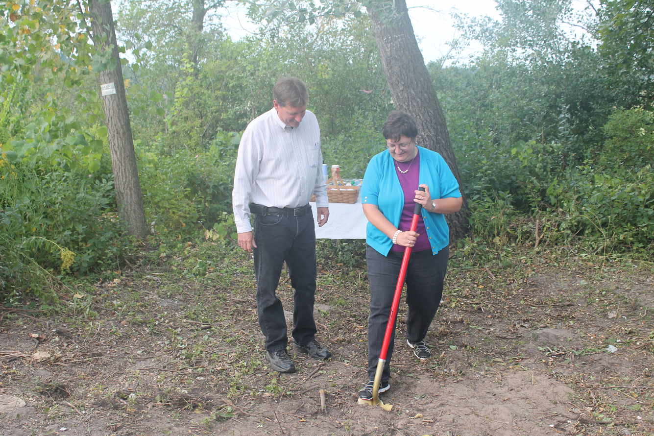 Township leadership with digging with shovels at groundbreaking of Harper park site